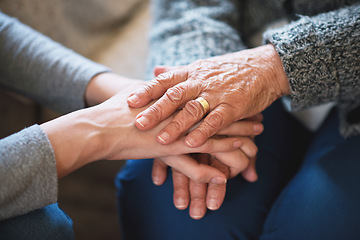 Image showing Elderly woman holding hands with daughter