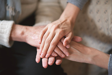 Image showing Elderly woman holding hands with daughter