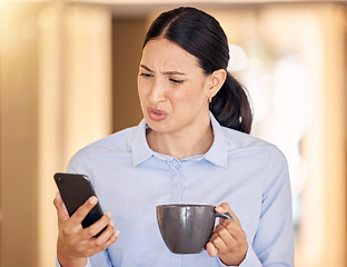 Image showing Annoyed, confused and stressed woman on phone reading an article on an online website. Disgusted business lady browsing on social media or the internet with smartphone at office with cup of coffee.