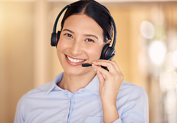 Image showing Call center agent, employee and worker with smile and headphone working at telemarketing company and helping people online at work. Portrait of face of happy customer service worker consulting