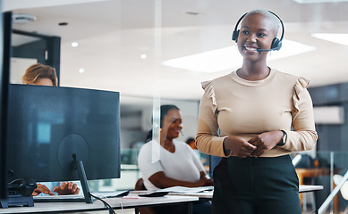 Image showing Call center, customer support or communication with a woman employee consulting, telemarketing and offering help. Customer service, contact us and consultant with a female giving advice and talking
