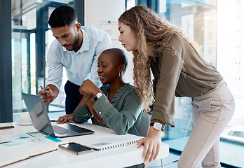 Image showing Team collaboration, online marketing and laptop planning for ideas, inspiration and strategy in startup company. Business people in diversity group working, meeting and discussion with internet tech