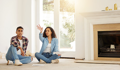 Image showing New house, couple and moving in while planning and talking about renovation plans and vision idea for their dream home. Young man and woman holding paper for interior design for their property