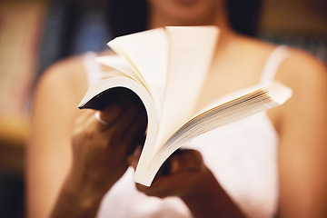 Image showing Hands reading books, paper and page in library, bookstore or home for learning, studying and education. College student, woman and academic with literature story, literacy and knowledge research