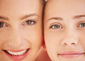 Image showing Family, mother and girl child feeling happy and showing sweet smile while standing together. Adoption, relationship and love of a caring mom with her child. Close up of eyes and faces of good dna