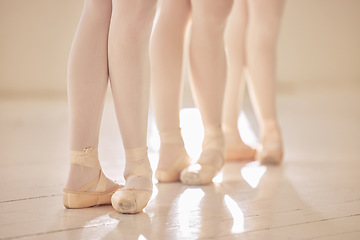 Image showing Ballet, feet or shoes of dancers dancing training and practicing for a performance in a studio. Closeup of an elegant, artistic and classy ballerina group or team preparing for a stage competition