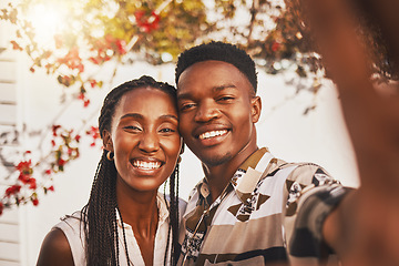 Image showing Selfie of happy black woman and man, couple in love on outdoor sunset date. Beautiful young girlfriend and boyfriend smile, photographs portrait memory together and share relationship online internet