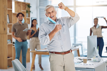 Image showing Covid, mask and celebration with business people cheering the end of lockdown, restrictions and regulations after the corona virus pandemic. Getting back to work, freedom and success in the office