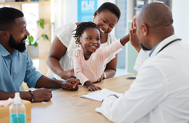 Image showing High five, doctor and family with a girl and her parents at the hospital for consulting, appointment and healthcare. Medicine, trust and support in a medical clinic with a health professional