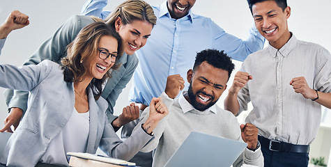 Image showing Celebration, winning and fist pump business people with laptop reading email report for finance, profit or success. Victory, bonus or yes hands sign of diversity team with good trading or crypto news