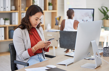 Image showing Office woman, desk and reading phone message and communication while working in corporate building. Young business executive and professional workplace girl looking at text on smartphone.