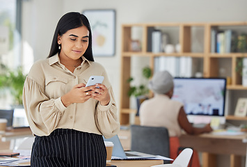 Image showing Phone, communication and networking with a business woman reading a message in her office at work. Contact us with mobile technology or wifi and connect to the future with growth and development