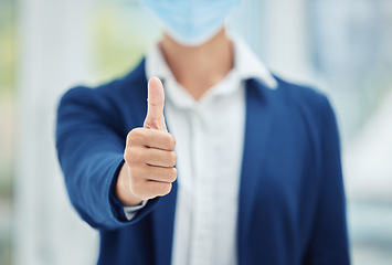 Image showing Covid, face mask and thumbs up business person in agreement with social distance proposal policy. Health safety regulation support and good news for corporate company virus protection at work.