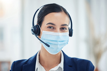 Image showing Call center, support or covid help worker with mask for safety and corona protection at work. CRM business telemarketing or customer service consultant consulting on covid 19 contact us question