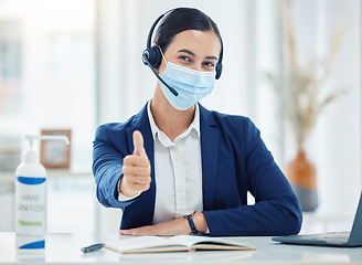 Image showing Covid, call center and customer support with a woman giving thumbs up while consulting and telemarketing with a headset to help, service and give advice. Contact us, crm and yes with a young female