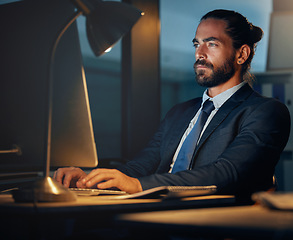 Image showing Working, typing and computer research of a seo and cryptocurrency technology developer working late. Web development of a fintech software worker planning iot and erp digital transformation at night