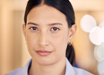 Image showing Skin, face and beauty with a confident, serious and focused woman inside on a blurred background. Skincare, head and closeup of a young female indoors with perfect, flawless and glowing complexion