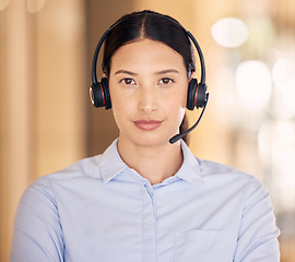 Image showing Telemarketing, contact us and customer service support agent ready to provide a good online service. Portrait of a serious sales consultant working at a call center. Tough agent looking ambitious