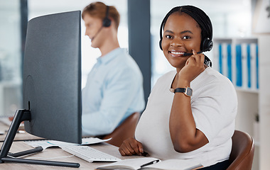 Image showing Sales, support and customer service call center consultant smiling while consulting with online clients in office. Contact us with happy agent enjoying job in telesales, excited about good service