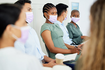 Image showing Covid, mask or conference for learning, training or development with business people in a workshop, tradeshow or seminar. Listening, audience or convention with staff during the corona virus pandemic