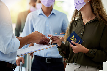 Image showing Covid, passport and travel with airport security reading ticket of a passenger or woman refugee for immigration and safety. Security, document and flight with a female in the corona virus pandemic