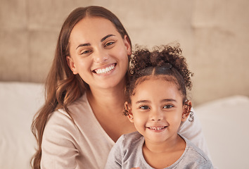 Image showing Happy, mother and girl with family smile in joy and happiness for love and care at home in the bedroom. Portrait of a smiling parent and child bonding in the house for mothers day or motherhood.