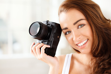 Image showing Portrait of happy woman photographer working in model studio doing photoshoot with camera. Career, creative and photography student doing media project. Lady with startup art production business.