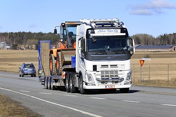 Image showing Volvo Truck Semi Trailer Hauls Heavy Equipment