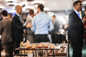 Image showing Blurred image of businesspeople at banquet event business meeting event. Business and entrepreneurship events concept