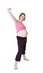 Image showing Success, motivation and winner mindset of a pregnant woman celebrating her pregnancy announcement. Excited, happy and achievement celebration of a future mother with energy feeling good in her body