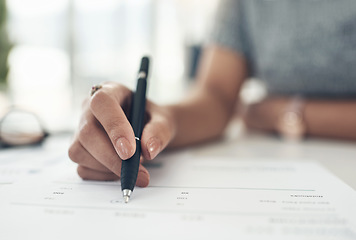 Image showing Writing, reading and making notes on finance, investment or tax contract and paperwork in an office. Hands closeup of a female financial worker planning, signing and working on banking forms
