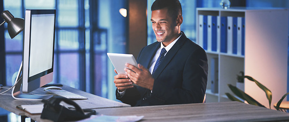 Image showing Business, office and man in technology on digital tablet by computer desk, happy for success and design at the workplace. Proud, successful and professional male in tech company for innovation work.