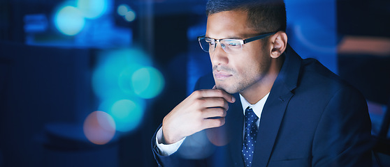 Image showing Businessman working, thinking and planning at night in a corporate company office. Networking for global communication or an international deal across time zones while trading with data and analytics