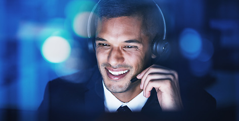 Image showing Telemarketing customer support, consultant and help man on an online phone consultation at night. Happy internet call center employee working on contact us digital web crm consulting in the dark