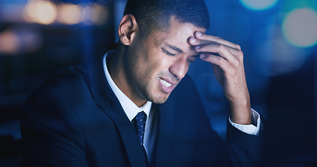 Image showing Headache, stress and burnout with businessman working late night in corporate office building. Anxiety, mental health and migraine pain with audit, tax or risk company employee sitting at desktop