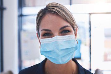 Image showing Covid, face and mask with a woman taking safety precaution for health and wellness inside during the corona virus pandemic. Restrictions, regulations and social distancing with a young female