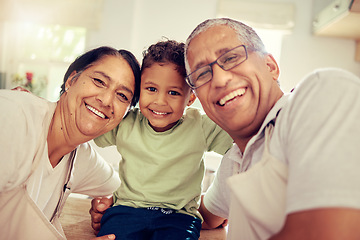 Image showing Grandparents, grandkid and family smile, happy and playing together at home. Portrait face of love, bond and relaxing elderly grandma, grandpa and young kid for funny, care and childhood development