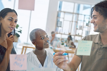 Image showing Planning, post it notes and diversity marketing business people working in partnership, collaboration and strategy seo meeting. Thinking, innovation and team work on glass for media advertising idea