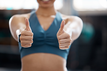 Image showing Woman, fitness and thumbs up to health, workout and training to live an active, wellness and healthy lifestyle with gym. Personal trainer, yes and thank you for positive energy in our sports club