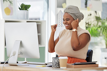 Image showing Success, celebration and happy business woman reading a positive email on computer, joy and winning. Excited black employee celebrating victory, good news or promotion with victory gesture in office