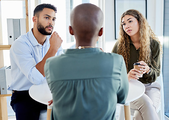 Image showing Business meeting, serious discussion or b2b negotiation with HR, leader or manager at a table . Communication, advisor or mentor talking, explaining and planning with team for problem solving idea