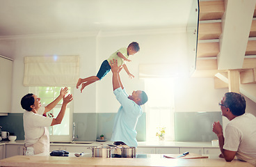 Image showing Family happy, home and father love of a man with his child in the air playing in a house kitchen. Generation of men smile at home with a fun time together and relax and comic mindset with sun shining