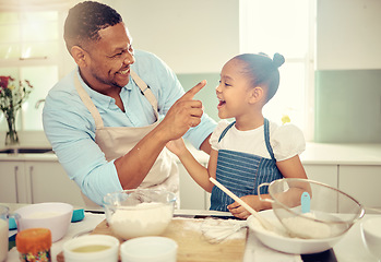 Image showing Baking dad, funny daughter and flour nose messy joke from happy learning, laughing child development and bonding in kitchen. Parent, kids and family home with cute, playful and sweet comedy together