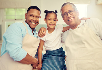 Image showing Portrait of happy family after cooking or baking in a kitchen together in a house. Father, grandpa and girl bonding with a smile, happiness and love during sweet and loving moments in kitchen