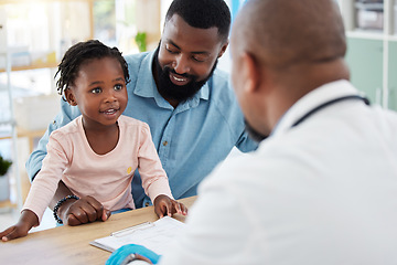 Image showing Doctor consulting with black family, baby and father in doctors office in hospital. Medicine wellness, healthy child development and consultation in nurse, healthcare and medical clinic with smile