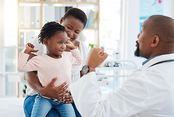 Image showing Pediatrician doctor with black family, baby and mother in clinic or hospital checkup appointment for growth wellness. Child in strong muscle flex for calcium with fun male medical pediatrics expert