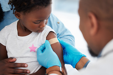 Image showing Child, healthcare vaccine and doctor with plaster for skin protection after injection appointment. Black kid and medical worker with bandage for healing of wound from needle medicine immunity.