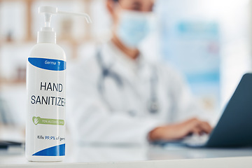 Image showing Covid, doctor and hand sanitizer or hygiene bottle on counter top, table or desk of medical healthcare hospital or clinic. Bacteria, medicine and safety with health pharmacist and virus pandemic