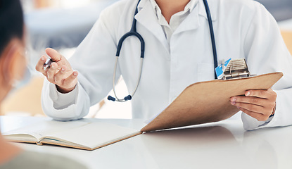 Image showing Doctor talking about health insurance at clinic, healthcare worker in meeting with sick patient and medical professional giving service. Consultant planning with documents in consultation at hospital