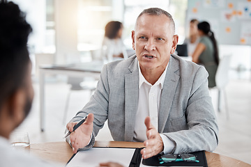 Image showing Interview, human resources and meeting with a business man talking to an employee in the hiring and recruitment process. Teamwork, strategy and vision between and manager or leader and intern